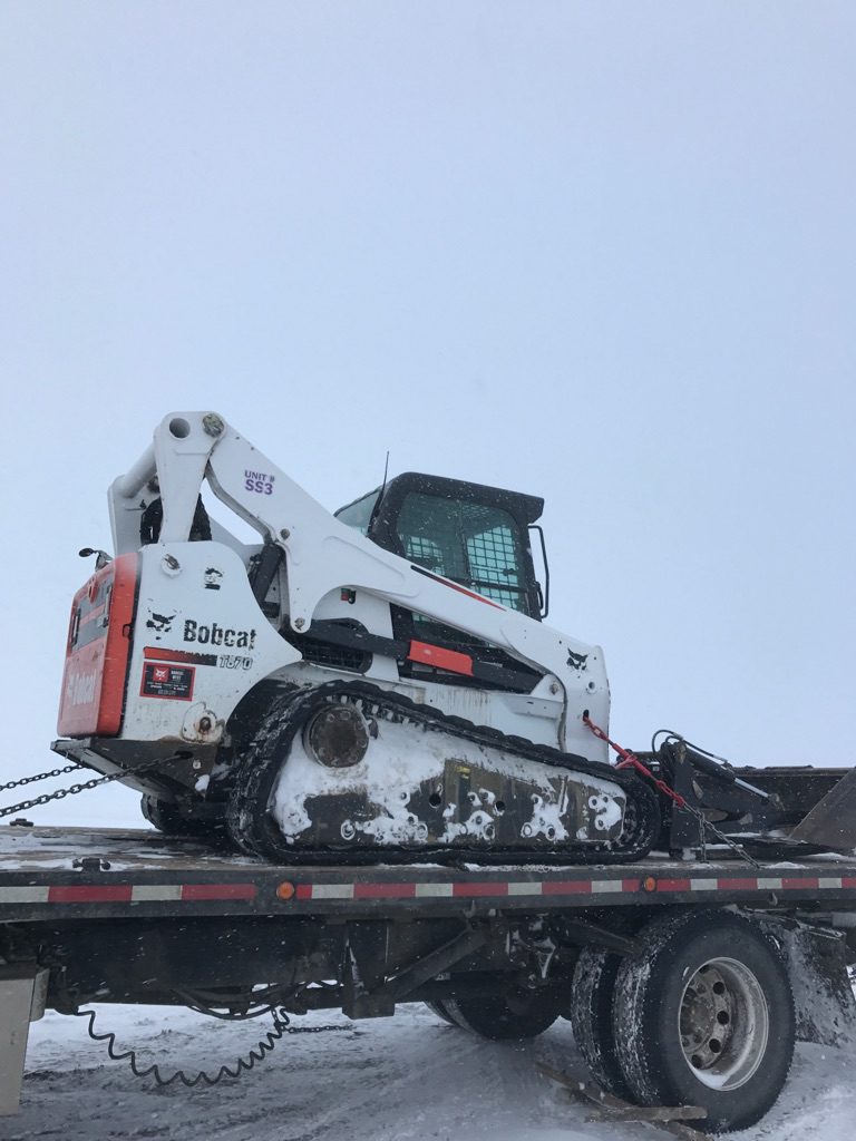Bobcat equipment on trailer
